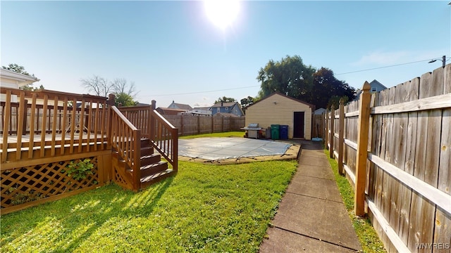 view of yard with a deck and a patio area