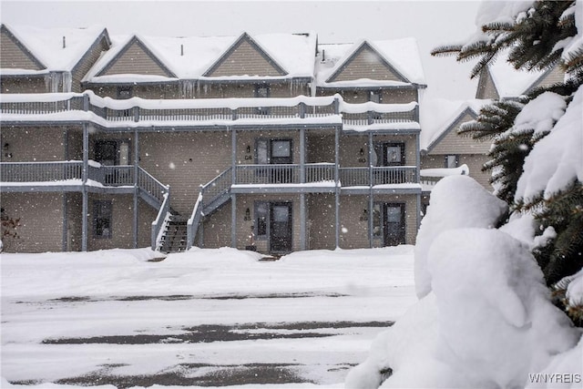 view of snow covered property