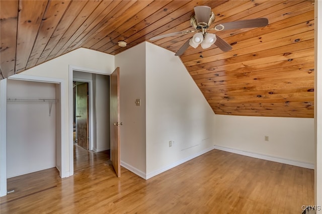 bonus room featuring light wood-type flooring, lofted ceiling, wooden ceiling, and ceiling fan