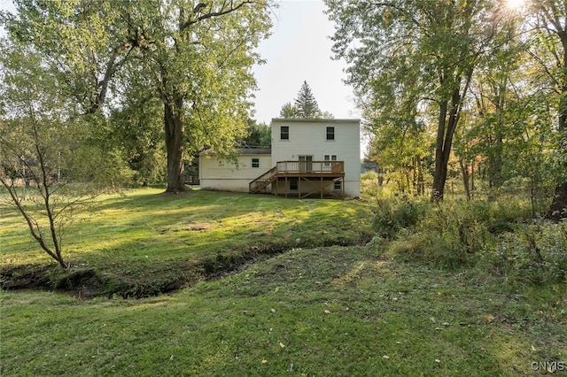 view of yard featuring a wooden deck