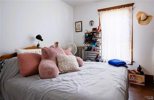 bedroom featuring hardwood / wood-style flooring