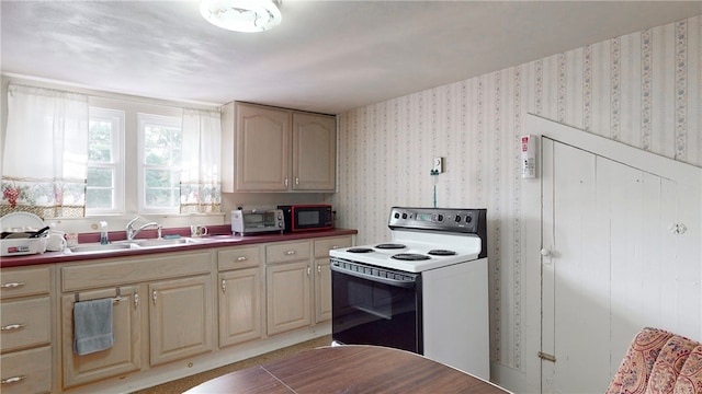 kitchen featuring sink and white electric range