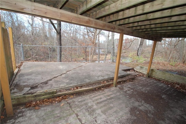 view of patio / terrace featuring fence