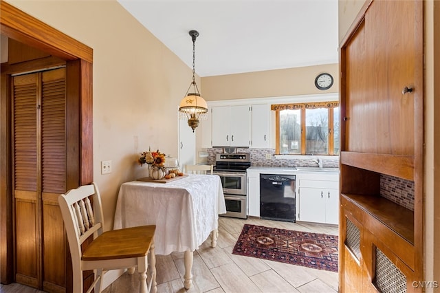 kitchen with decorative backsplash, electric stove, decorative light fixtures, dishwasher, and white cabinets