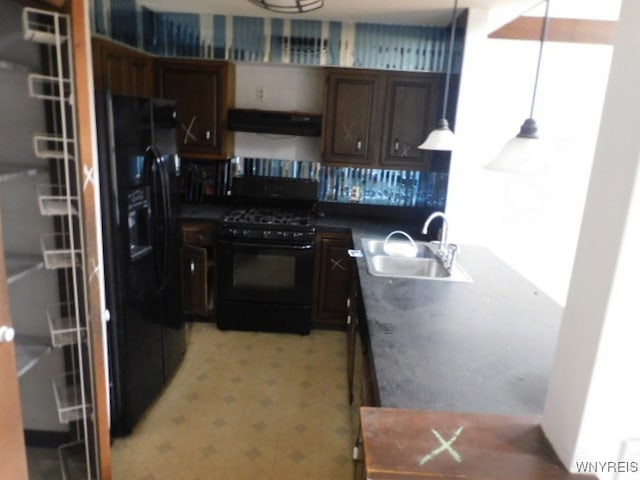 kitchen with dark brown cabinets, exhaust hood, sink, black appliances, and hanging light fixtures