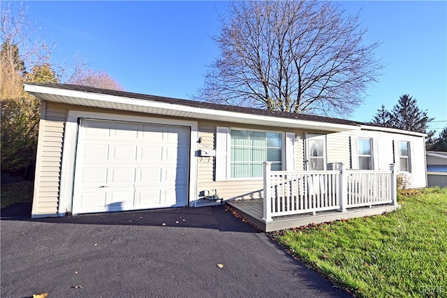 single story home featuring a garage