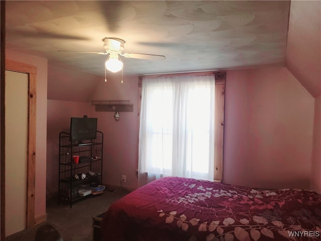 bedroom featuring carpet flooring, ceiling fan, and lofted ceiling