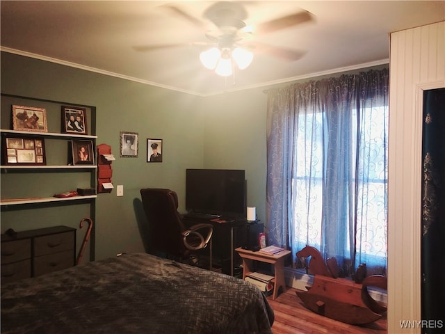 bedroom with multiple windows, ceiling fan, and crown molding