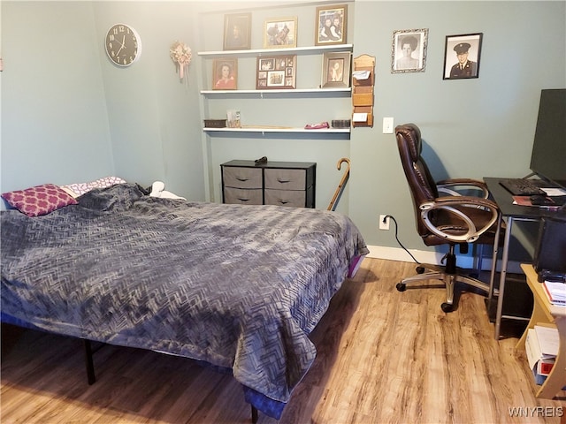 bedroom featuring light hardwood / wood-style flooring