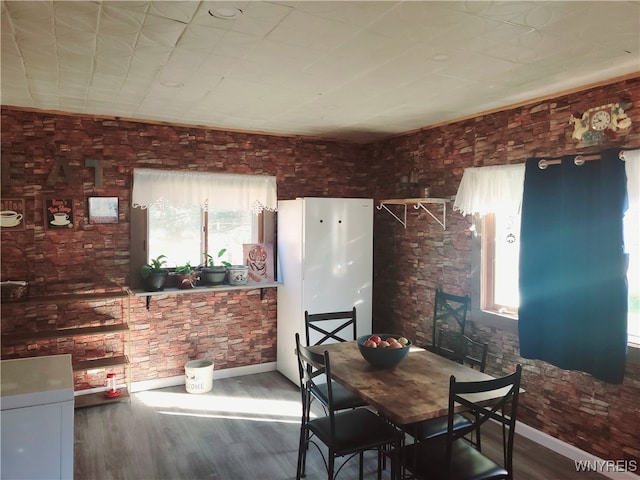 dining space featuring hardwood / wood-style floors