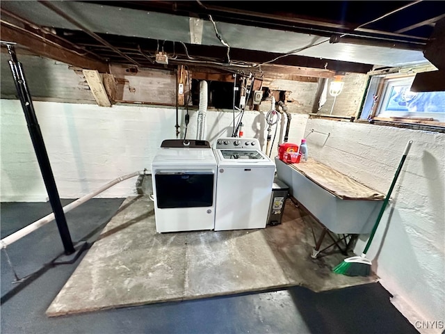 washroom with independent washer and dryer