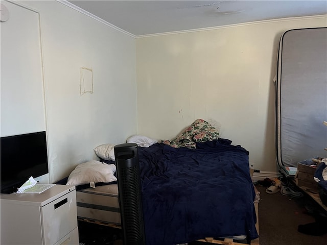 bedroom featuring crown molding