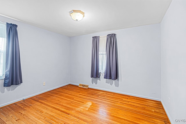 empty room featuring light hardwood / wood-style floors