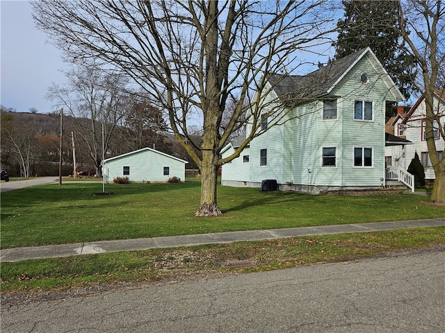 view of home's exterior featuring a lawn