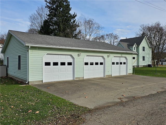 garage with a lawn