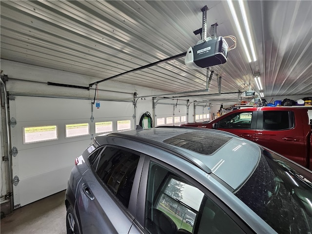 garage featuring a garage door opener