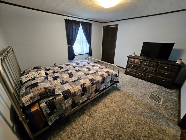 bedroom featuring carpet floors and ornamental molding