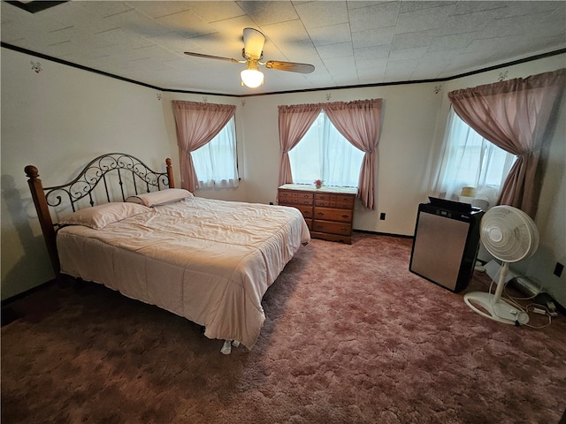 bedroom with dark carpet and ceiling fan