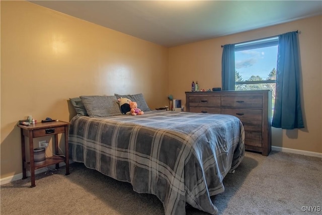 bedroom featuring light carpet