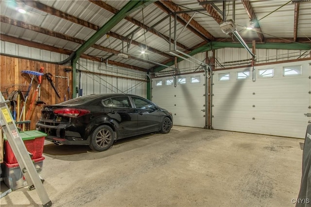 garage featuring a garage door opener