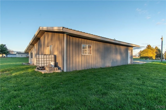 view of home's exterior featuring a lawn