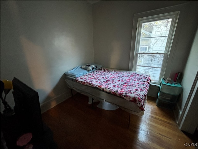 bedroom featuring hardwood / wood-style flooring