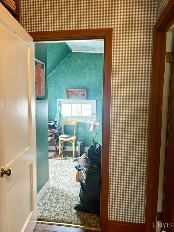 bathroom with lofted ceiling