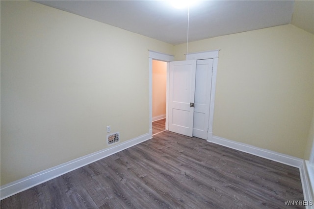 interior space with dark wood-type flooring