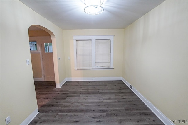 interior space with dark hardwood / wood-style flooring