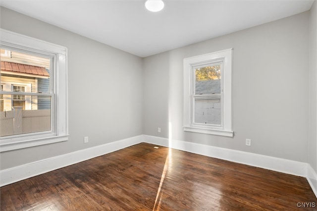 empty room featuring hardwood / wood-style flooring