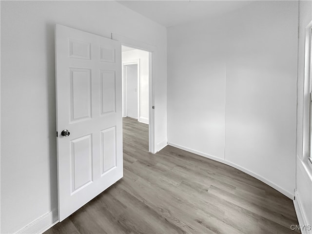 spare room featuring light hardwood / wood-style floors