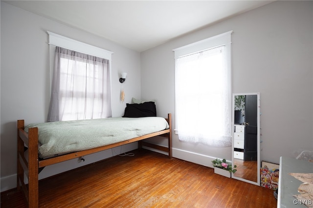 bedroom with wood-type flooring