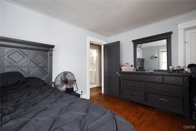 bedroom featuring dark wood-type flooring