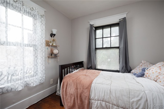 bedroom featuring dark hardwood / wood-style floors