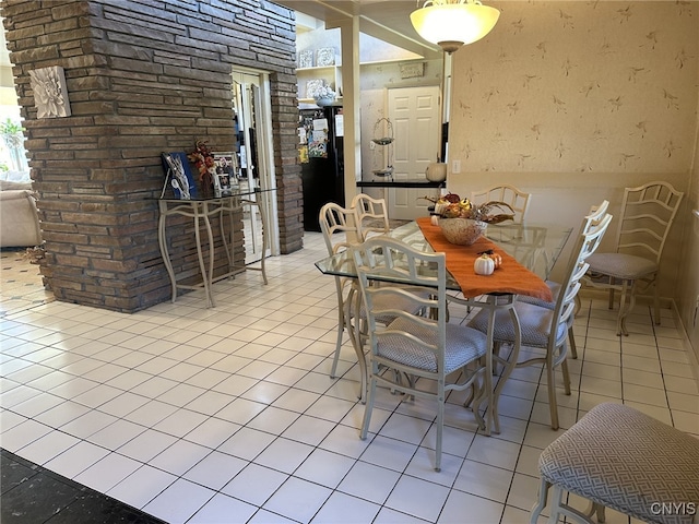 dining space with light tile patterned floors