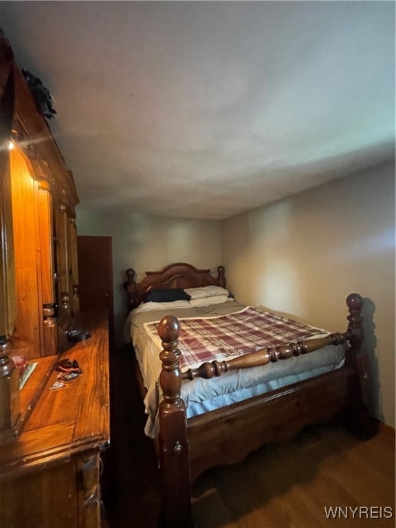 bedroom featuring hardwood / wood-style flooring