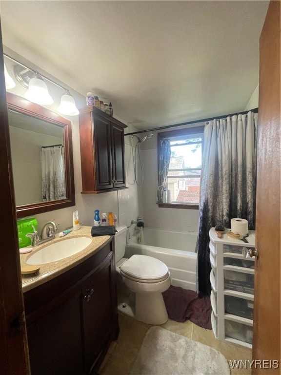 full bathroom featuring tile patterned flooring, vanity, toilet, and shower / bathtub combination with curtain