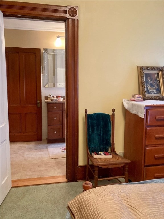 bedroom featuring light colored carpet