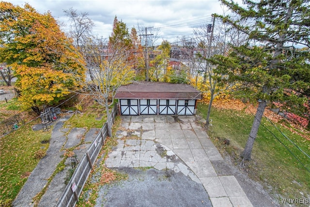 67 Harvard Pl, Buffalo, NY 14209 - view of patio / terrace featuring a garage and an outdoor structure
