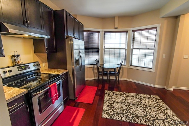67 Harvard Pl, Buffalo, NY 14209 - kitchen with dark brown cabinetry, dark hardwood / wood-style flooring, and stainless steel appliances