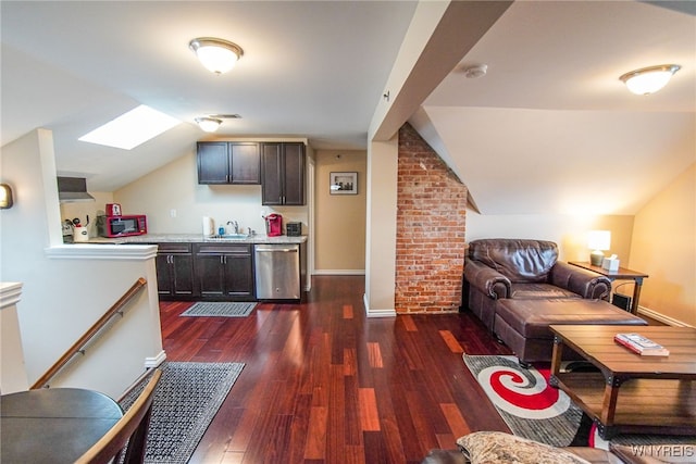 67 Harvard Pl, Buffalo, NY 14209 - living room with brick wall, dark hardwood / wood-style floors, lofted ceiling, and sink