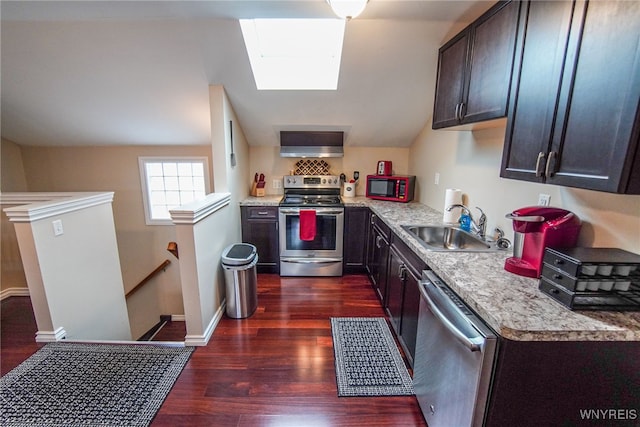 67 Harvard Pl, Buffalo, NY 14209 - kitchen with light stone counters, dark brown cabinetry, stainless steel appliances, dark wood-type flooring, and sink
