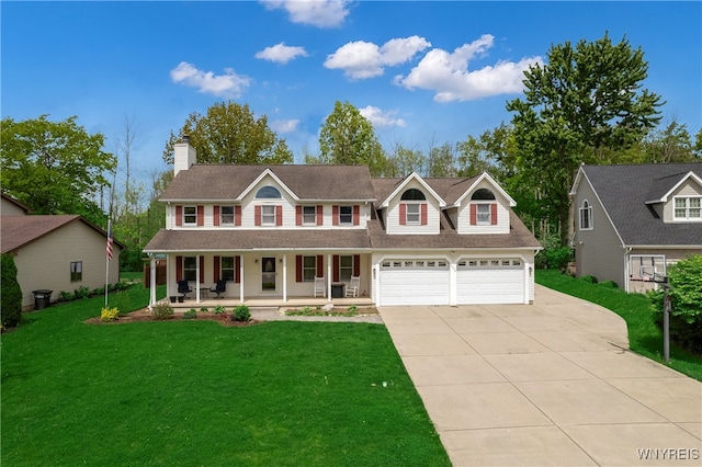 colonial home featuring covered porch and a front lawn