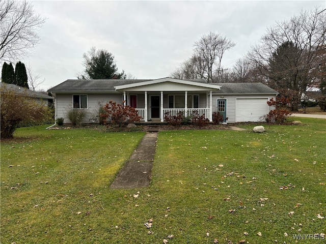 view of front facade with a front yard, a porch, and a garage