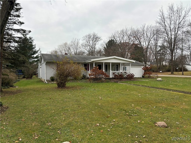 view of front of home with a porch, a garage, and a front lawn