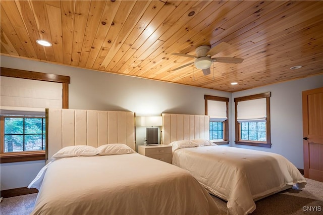 2773 S Shore Rd, Webb, NY 13420 - bedroom with wood ceiling, carpet, multiple windows, recessed lighting, and a ceiling fan