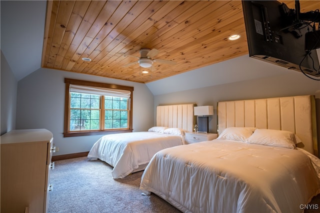 carpeted bedroom featuring ceiling fan, wooden ceiling, and vaulted ceiling