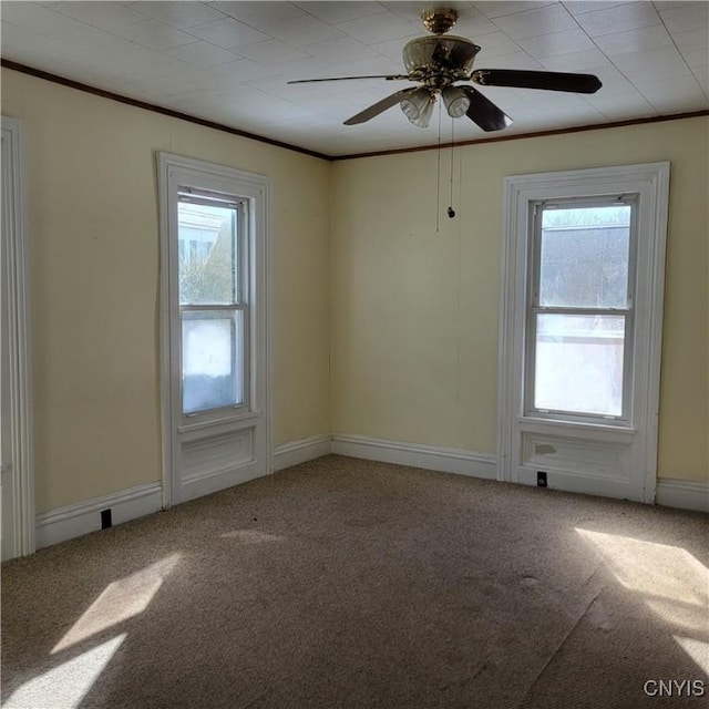20 Pearl St, Bainbridge, NY 13733 - carpeted spare room featuring ornamental molding, ceiling fan, and baseboards