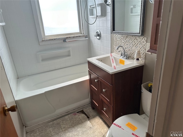 20 Pearl St, Bainbridge, NY 13733 - bathroom with backsplash, toilet, vanity, and shower / tub combination