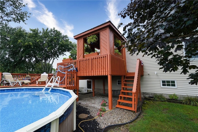 view of swimming pool featuring a deck